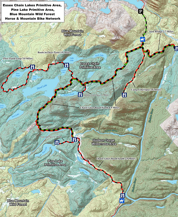 Should mountain biking be allowed on the former logging roads in the Essex Chain Lakes Primitive area?