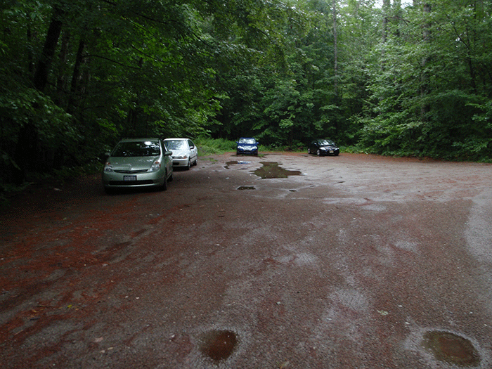 The parking area at the beginning of the Crane Pond Road, used by some members of the public.