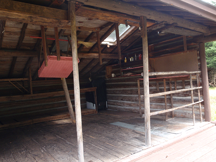 The Chub Pond Lean-to 1 has been extensively modified with bunks, counters, shelves, a gas stove, railings, and various tables and chairs. No other lean-to is managed like this one.