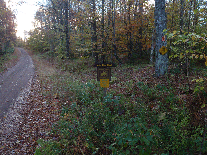 Another section of road in the Long Pond Conservation Easement, which is marked open for ATV riding.