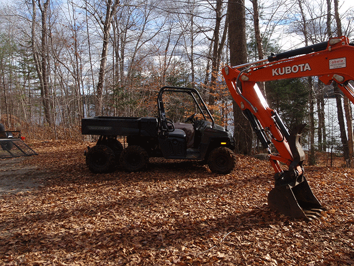 This ATV is used to haul supplies and people up and down the new class II community connector snowmobile trail to Harris Lake. This stands in stark contrast with how supplies and people are transported for construction of a foot trail.